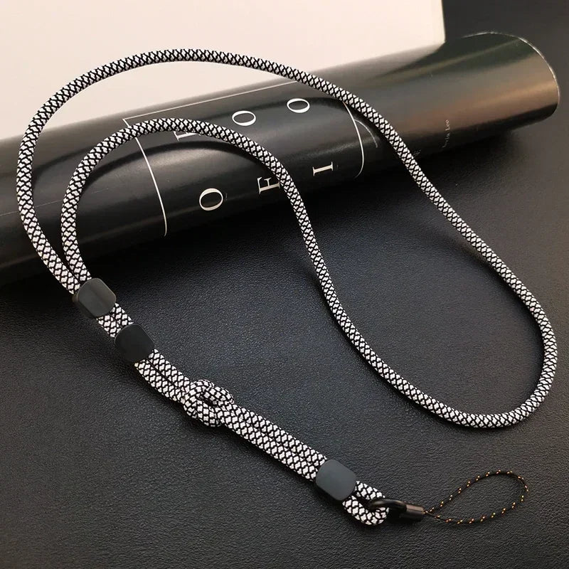 Handy-Nackenband, geflochtenes Seil in Schwarz-Weiß mit Netzmuster, schwarze Silikonperlen und Zierknoten