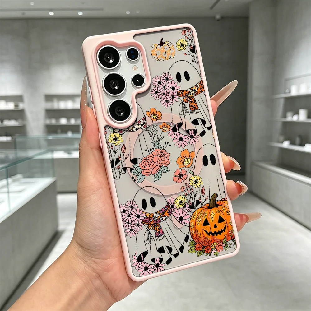 Rosa Samsung Galaxy Hülle mit Halloween-Geistern, bunten Blumen und Kürbis-Print, magnetischer Ring, in Hand