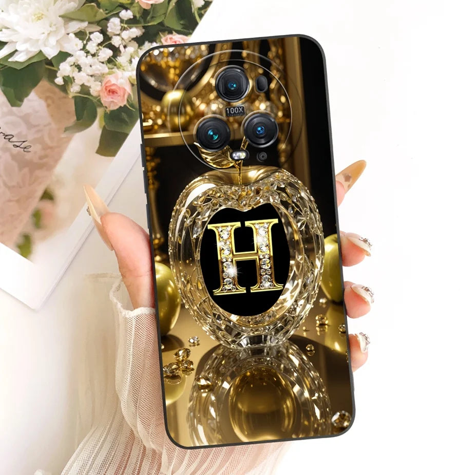 Schwarze Honor Magic 5 Hülle mit goldenem Buchstabe H in Kristallherz-Motiv, goldenes Luxus-Design, Rückansicht