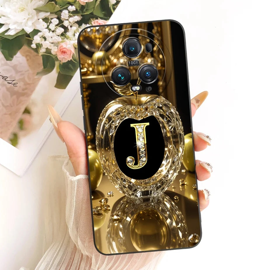 Honor Magic 5 Pro Hülle in Schwarz-Gold, Rückseite mit goldenem Kristallapfel-Motiv und Initiale J mit Diamanten